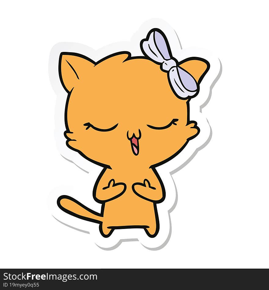 sticker of a cartoon cat with bow on head