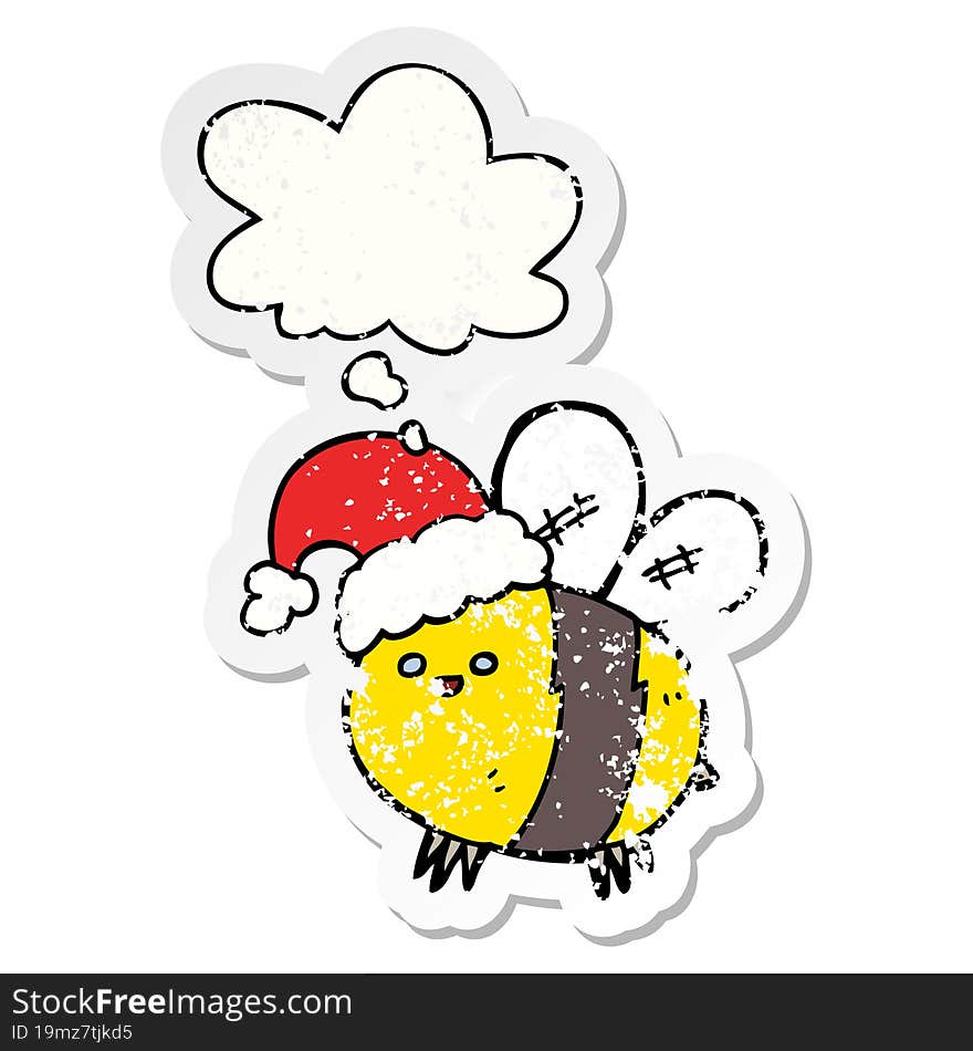 cute cartoon bee wearing christmas hat with thought bubble as a distressed worn sticker