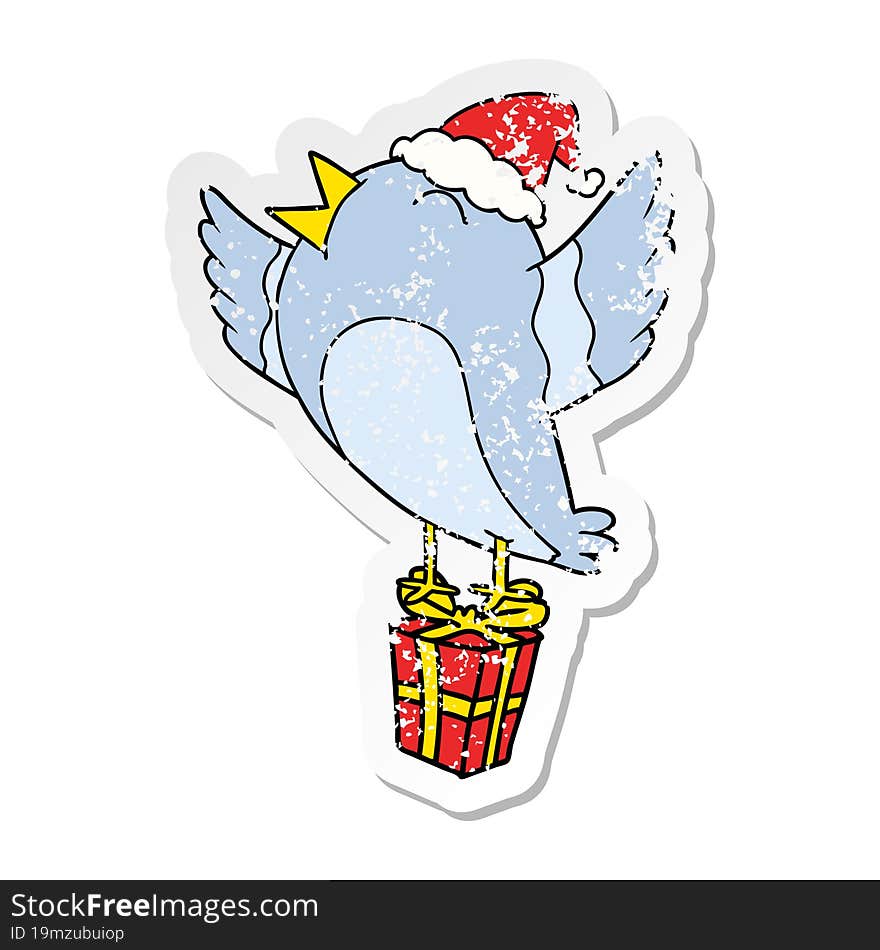 hand drawn distressed sticker cartoon of a bird wearing santa hat