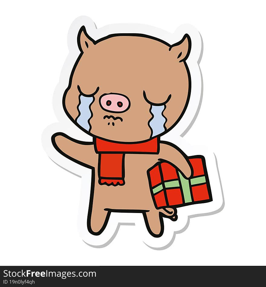 sticker of a cartoon pig crying over christmas present