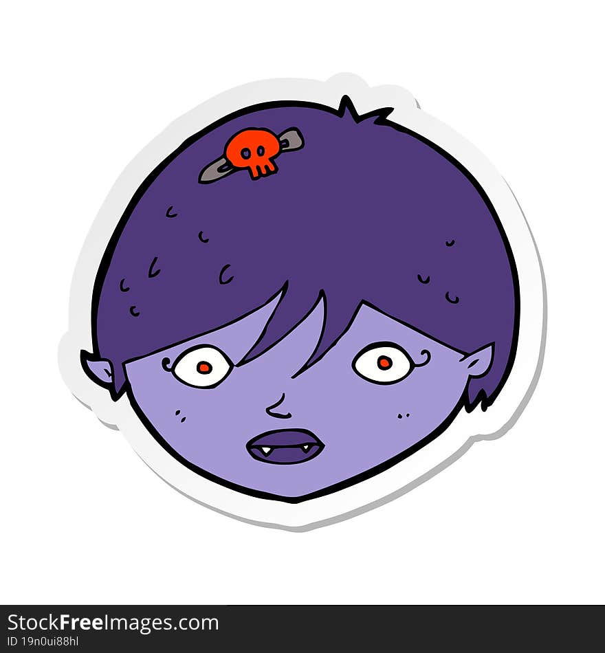 sticker of a cartoon vampire face