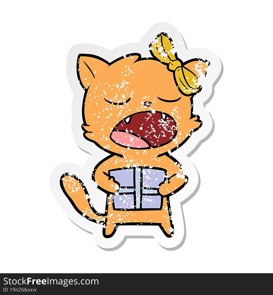 Distressed Sticker Of A Cartoon Cat With Christmas Present