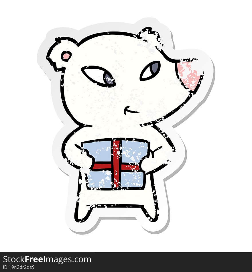 distressed sticker of a cute cartoon polar bear with xmas present