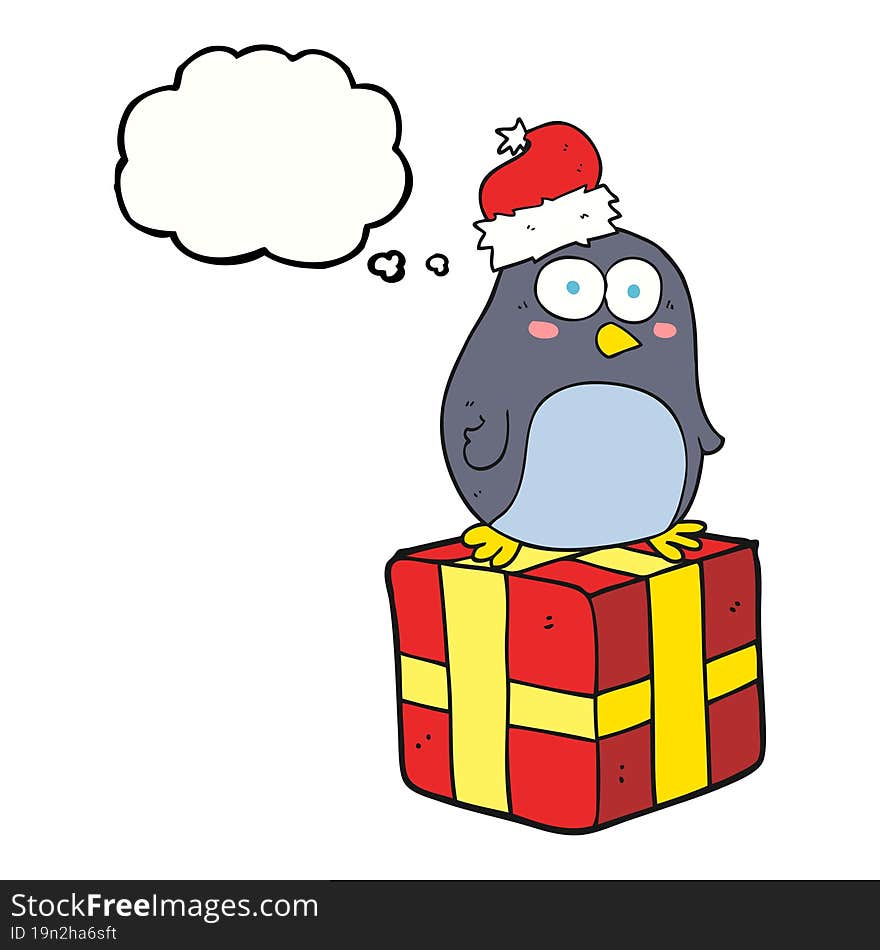 freehand drawn thought bubble cartoon christmas penguin