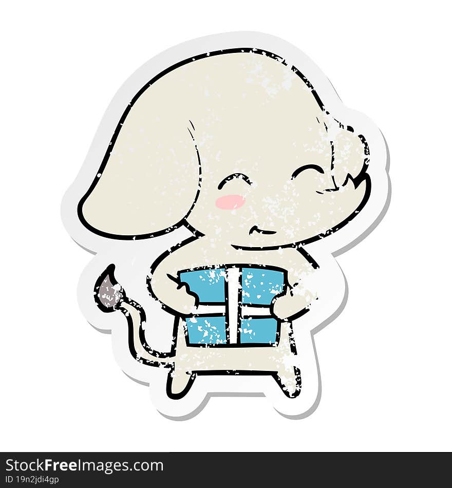 distressed sticker of a cute cartoon elephant with gift