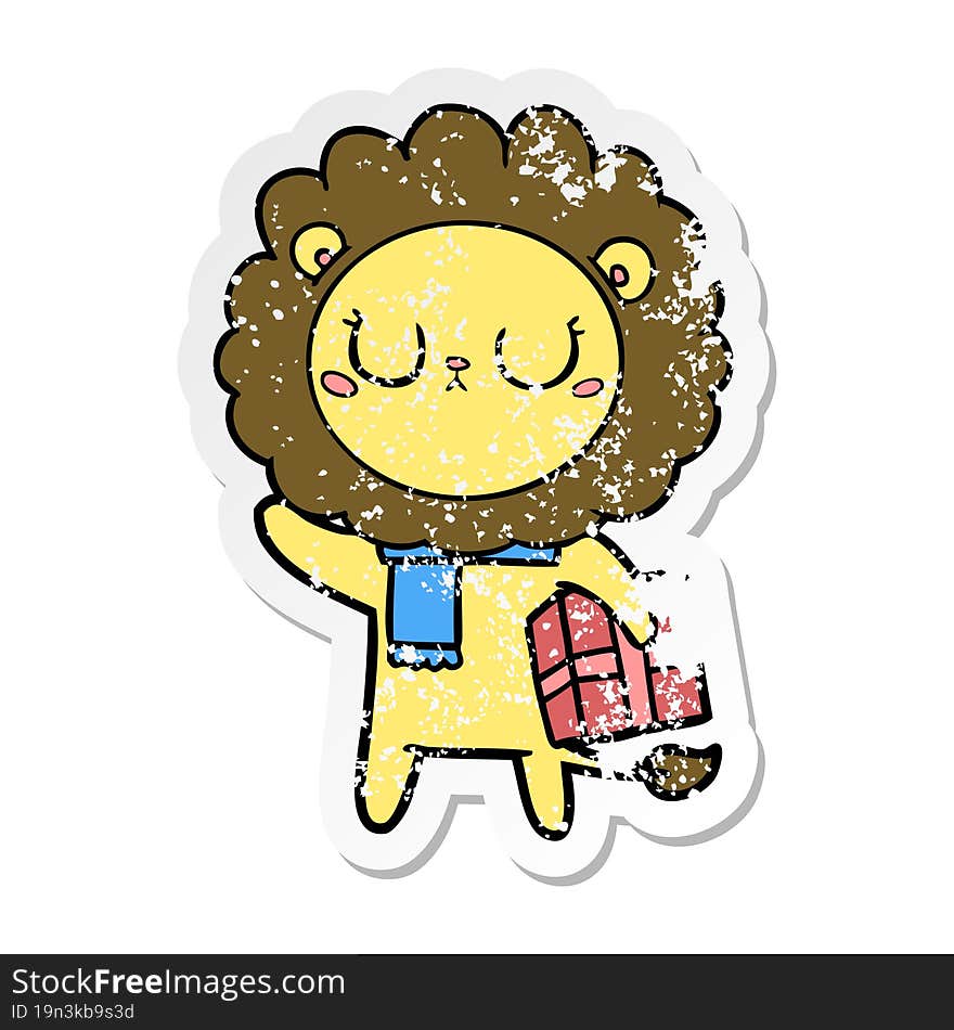 distressed sticker of a cartoon lion with christmas present