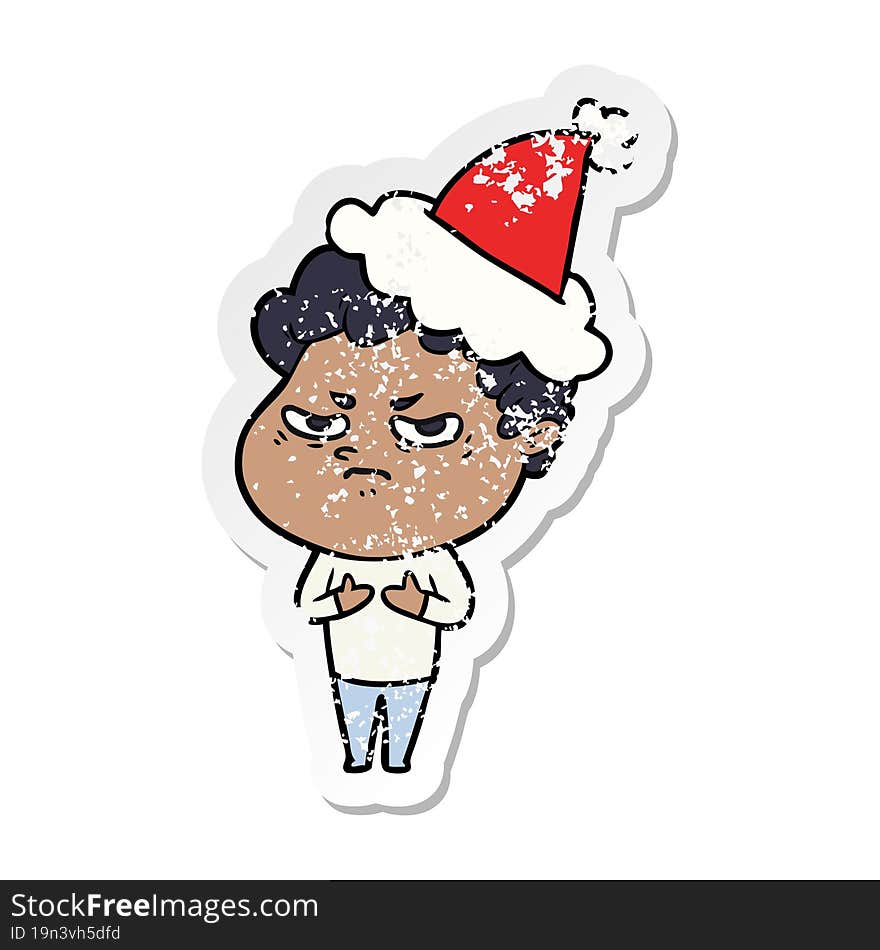 distressed sticker cartoon of a angry man wearing santa hat