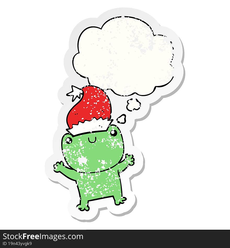 cute cartoon frog wearing christmas hat with thought bubble as a distressed worn sticker