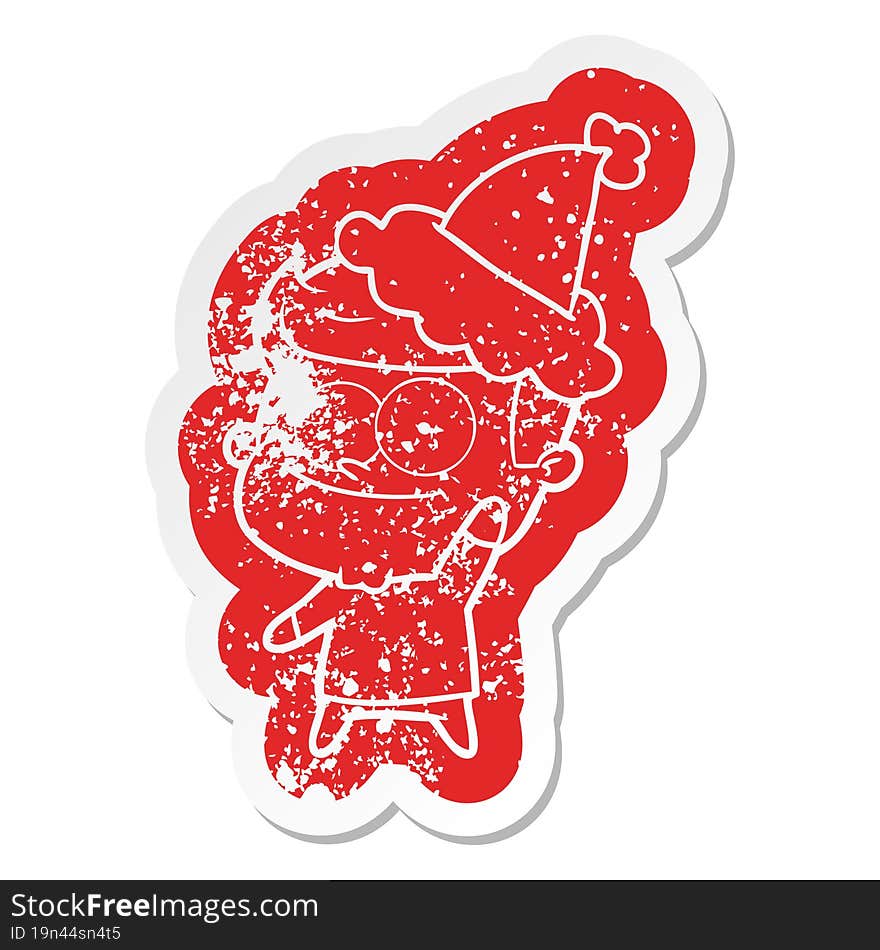 cartoon distressed sticker of a happy man wearing santa hat