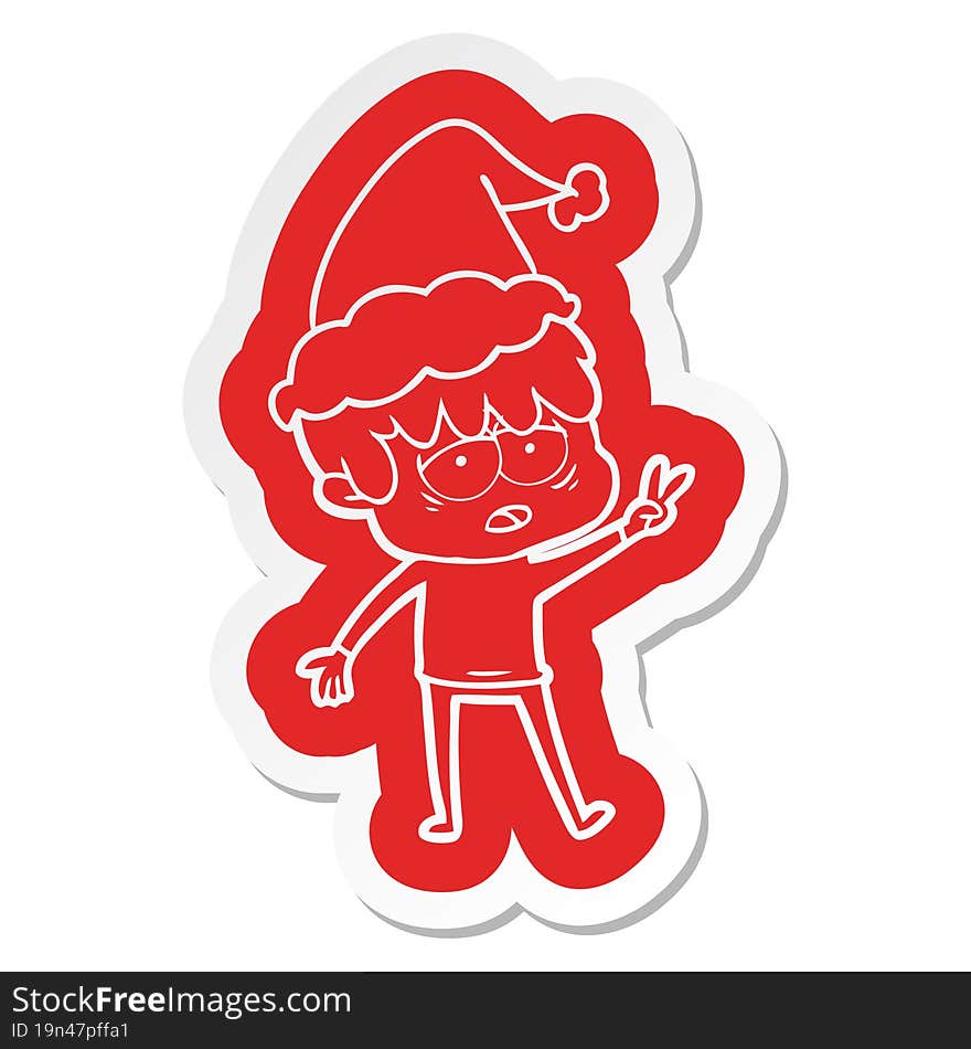 cartoon  sticker of a exhausted boy wearing santa hat