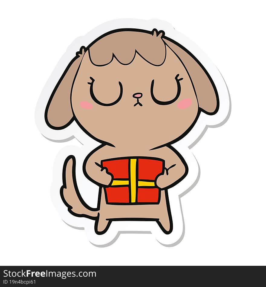 sticker of a cute cartoon dog with christmas present