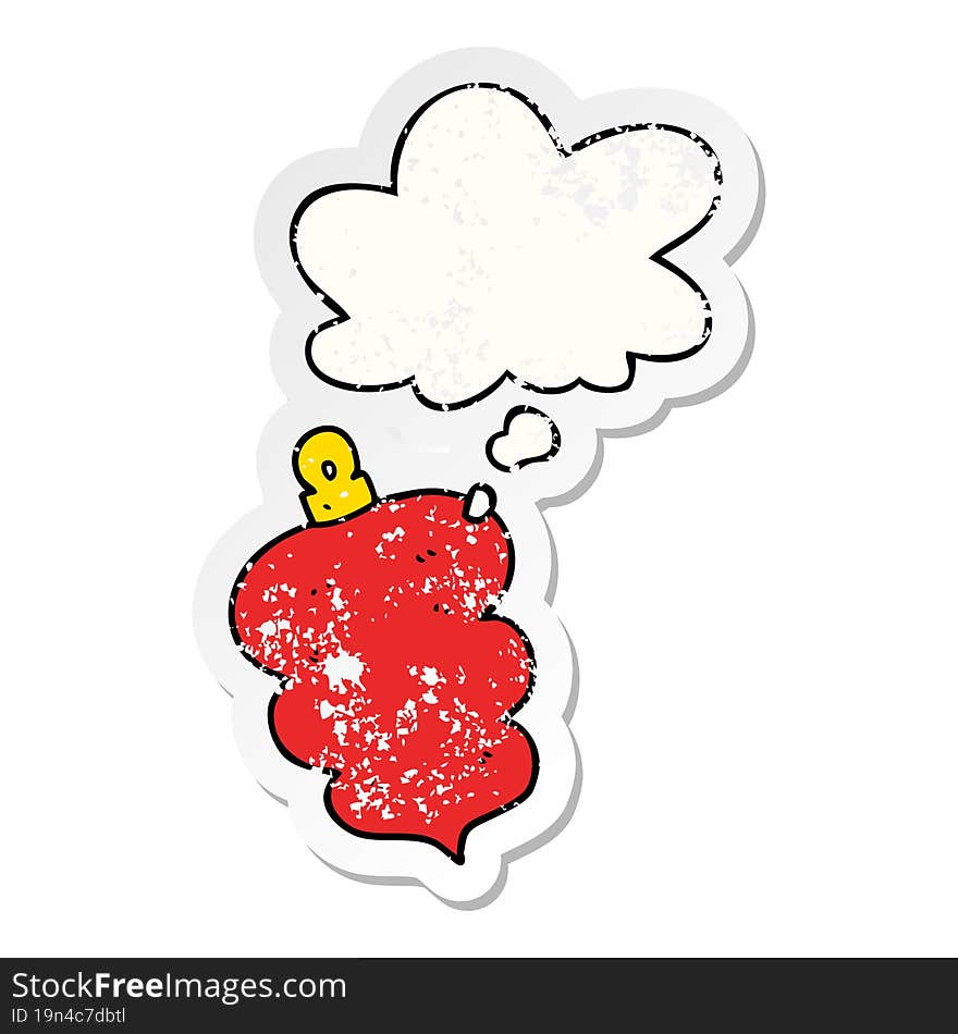 cartoon christmas bauble and thought bubble as a distressed worn sticker