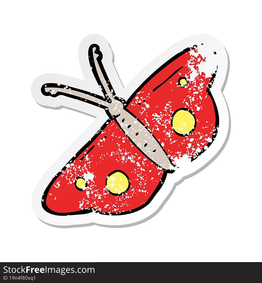 Retro Distressed Sticker Of A Cartoon Butterfly Symbol