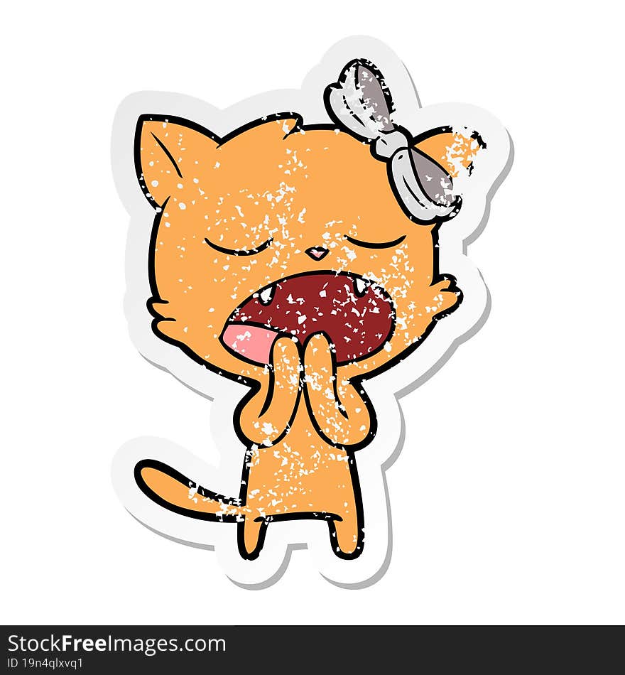 distressed sticker of a cartoon yawning cat