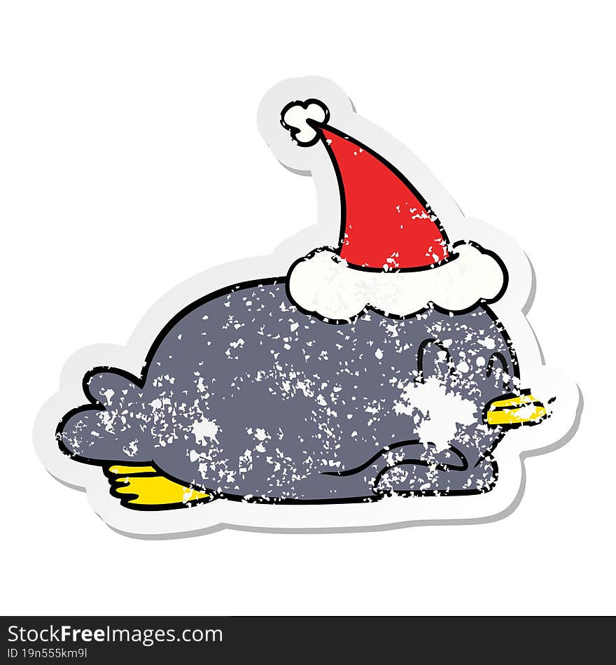 Penguin Lying On Belly Wearing Santa Hat