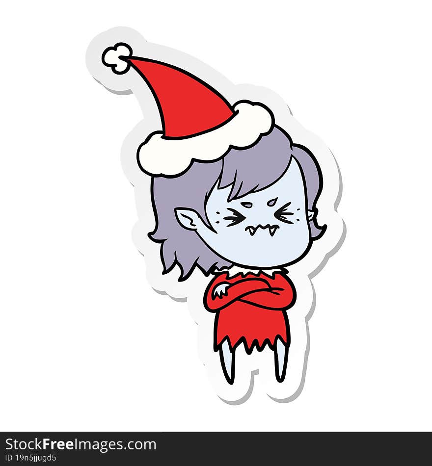 annoyed sticker cartoon of a vampire girl wearing santa hat