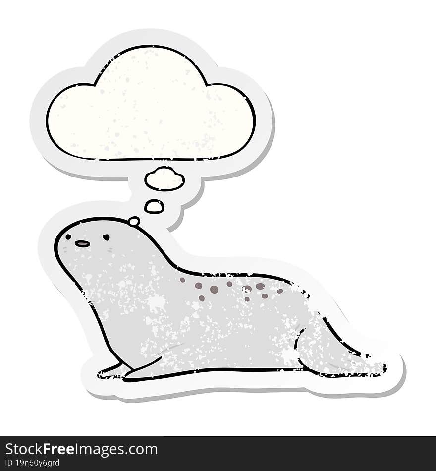 cartoon seal and thought bubble as a distressed worn sticker