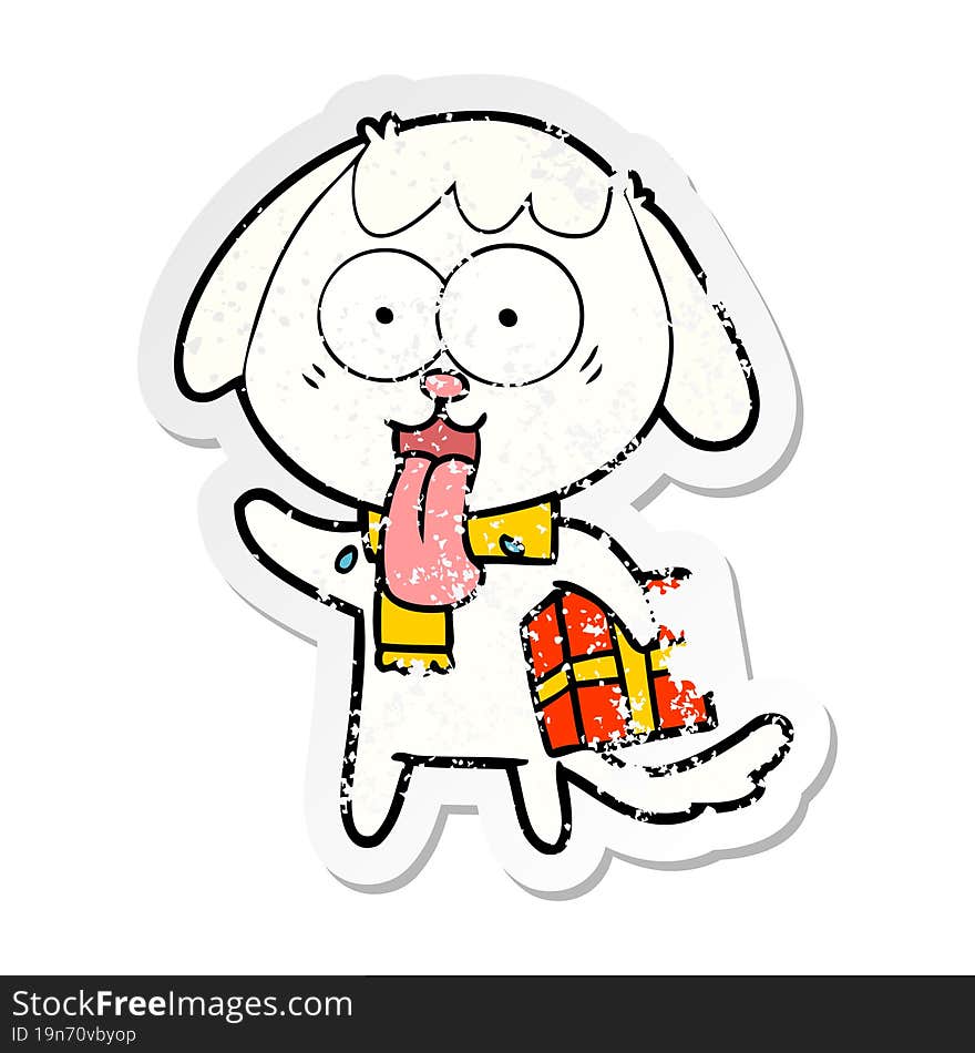 distressed sticker of a cute cartoon dog with christmas present