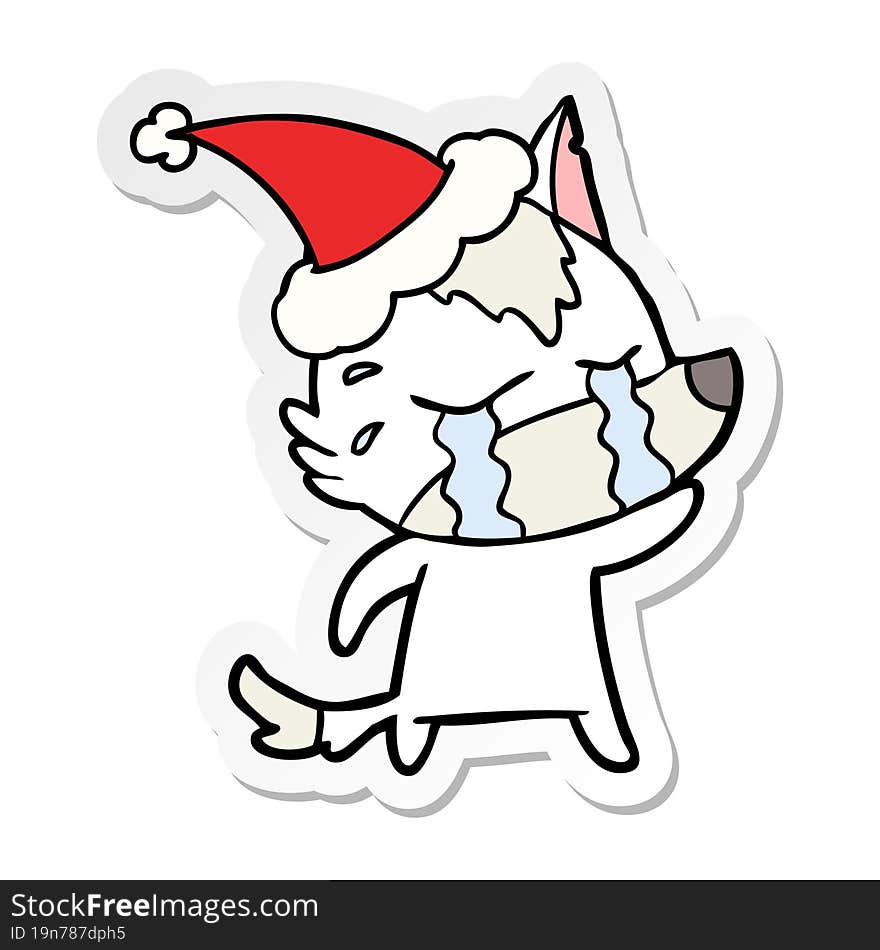 Sticker Cartoon Of A Crying Wolf Wearing Santa Hat