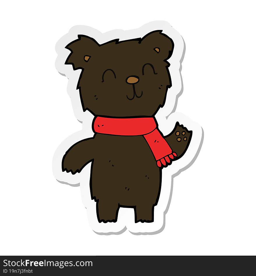 sticker of a cartoon cute black bear cub