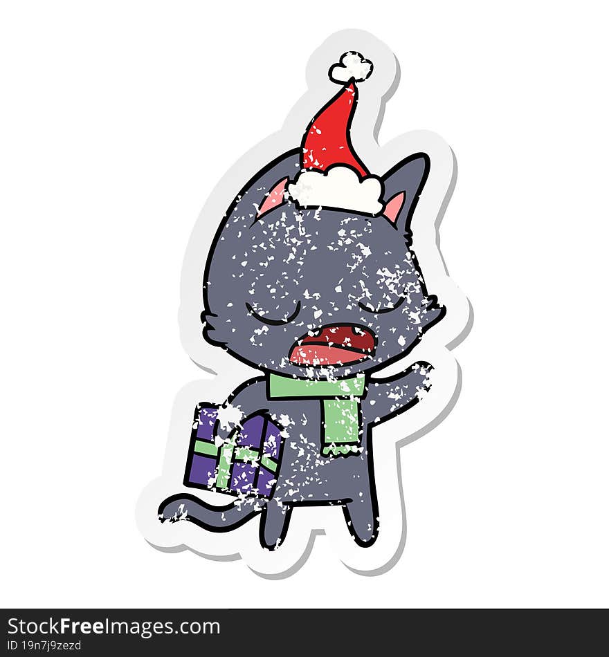 talking cat distressed sticker cartoon of a wearing santa hat