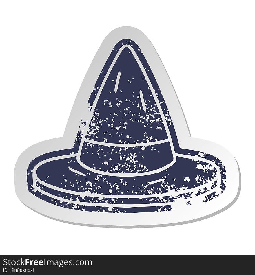 distressed old sticker of a witches hat