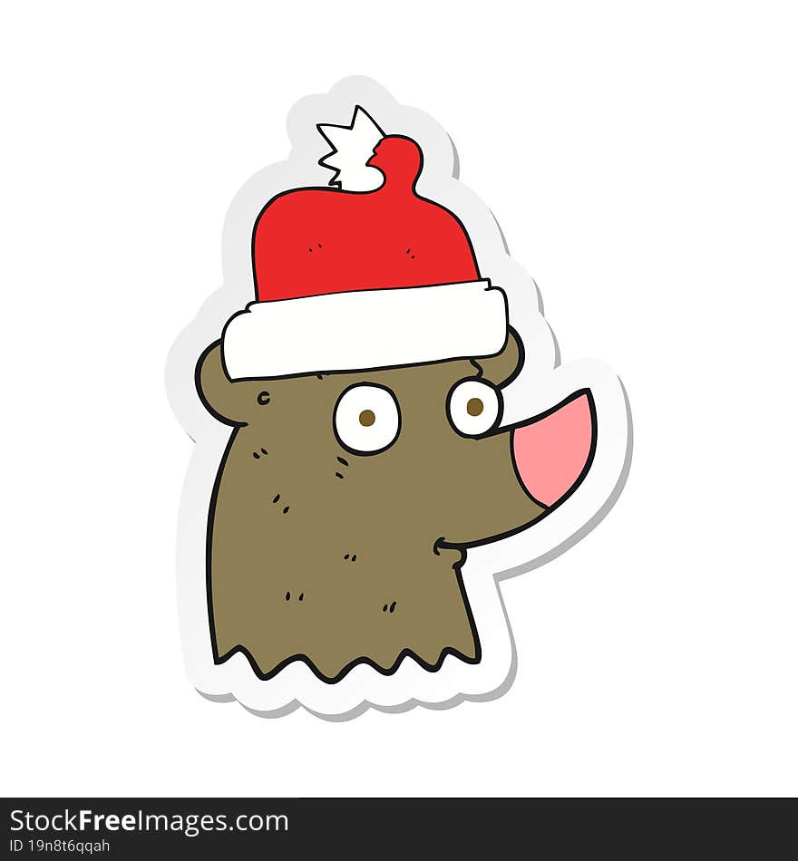 sticker of a cartoon bear wearing christmas hat