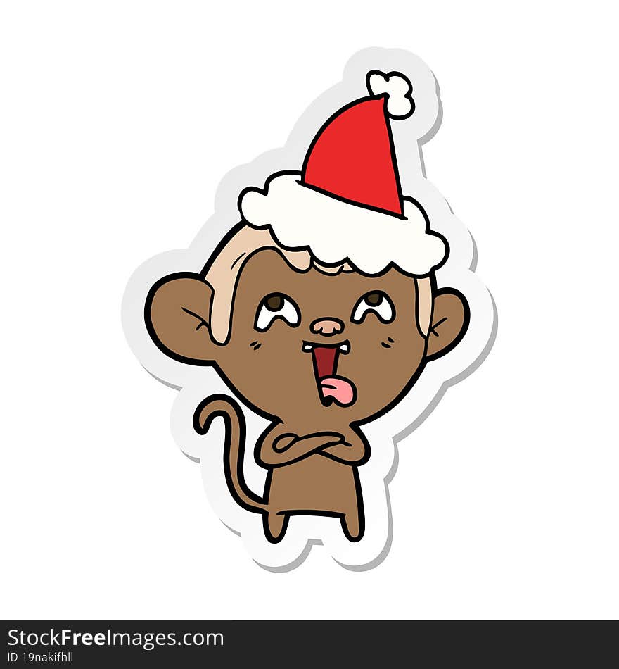 crazy sticker cartoon of a monkey wearing santa hat