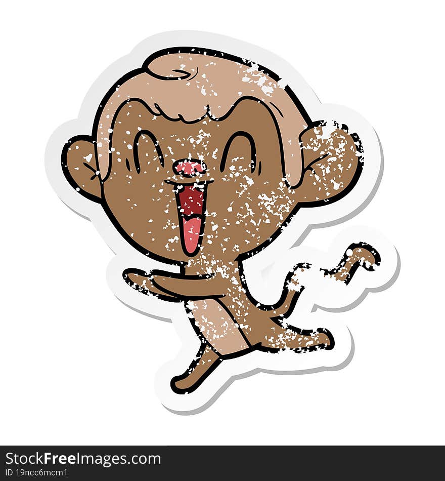 distressed sticker of a cartoon laughing monkey