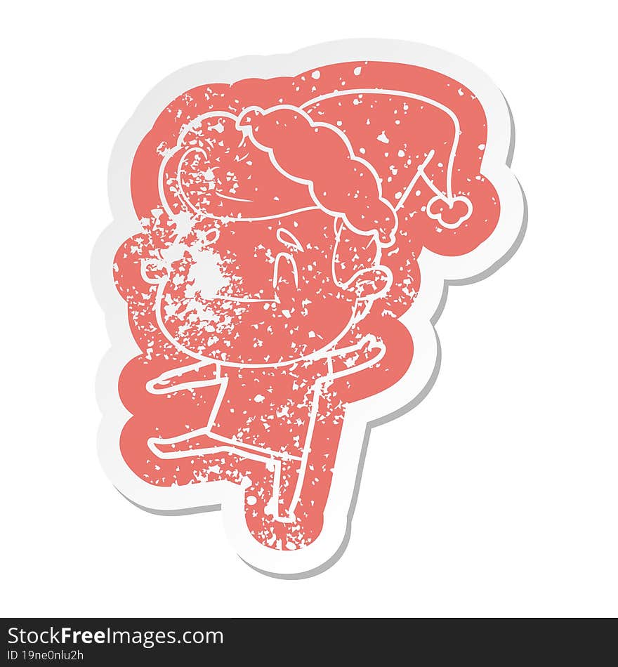 happy quirky cartoon distressed sticker of a man wearing santa hat