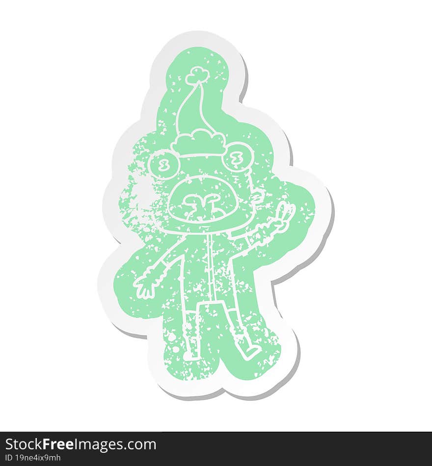 cartoon distressed sticker of a weird alien waving wearing santa hat