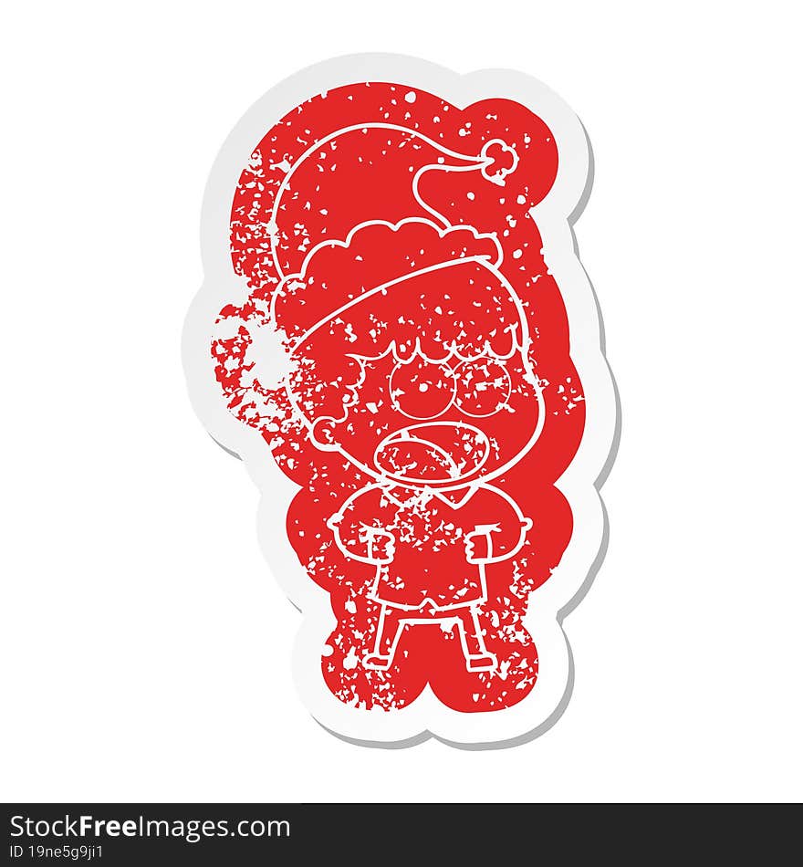 quirky cartoon distressed sticker of a shocked man wearing santa hat