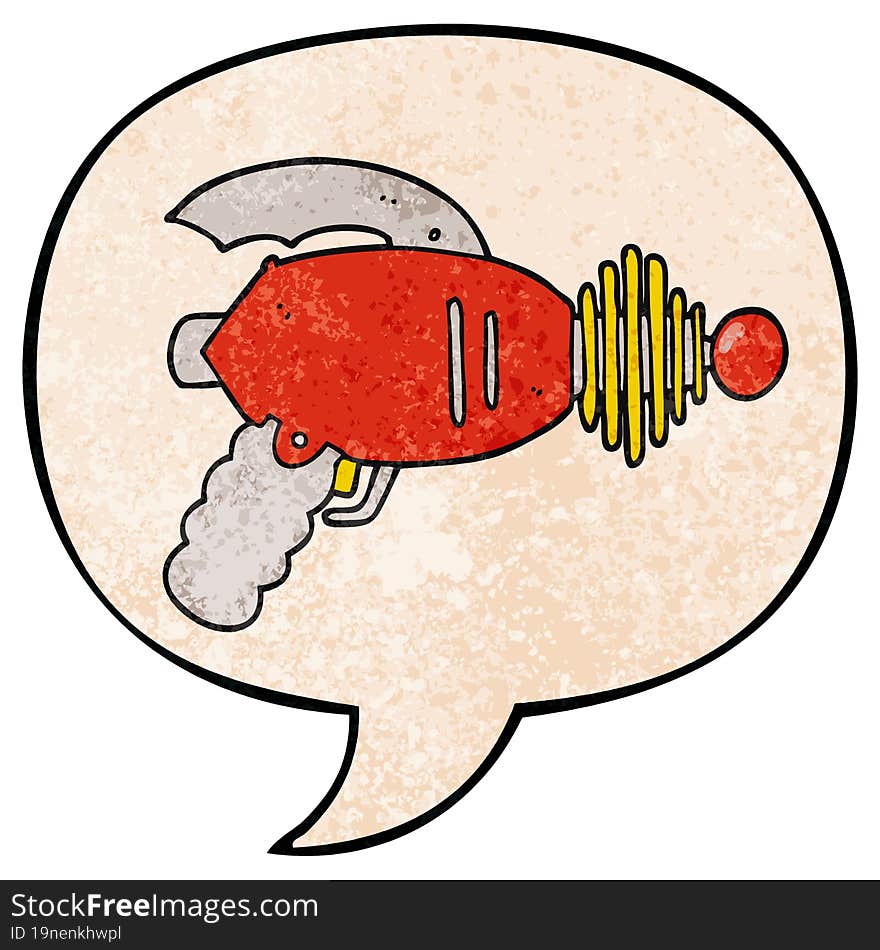 cartoon ray gun and speech bubble in retro texture style