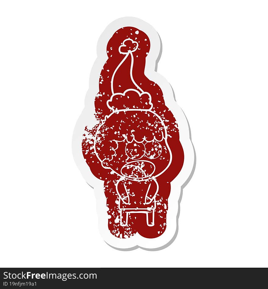 quirky cartoon distressed sticker of a shocked man wearing santa hat