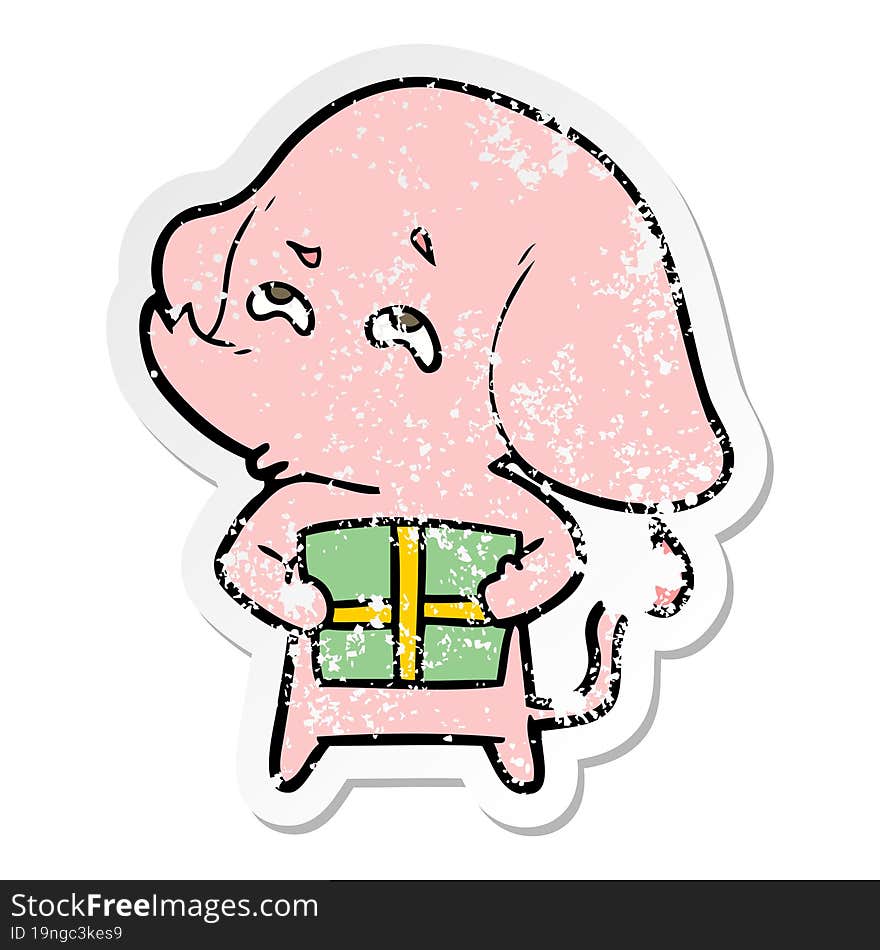 distressed sticker of a cartoon elephant with gift remembering