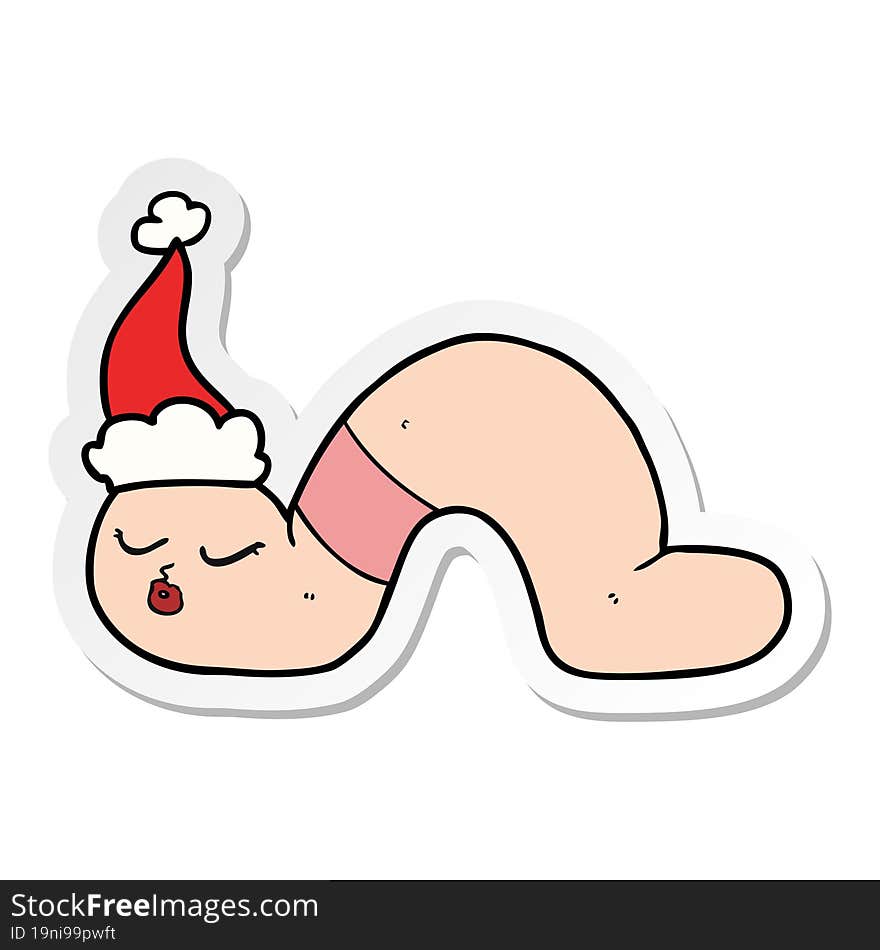 sticker cartoon of a worm wearing santa hat