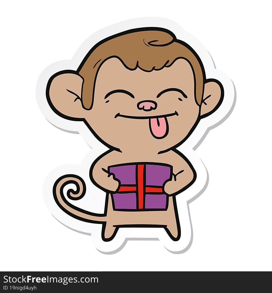 sticker of a funny cartoon monkey with christmas present