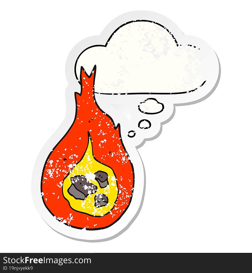 cartoon fireball and thought bubble as a distressed worn sticker