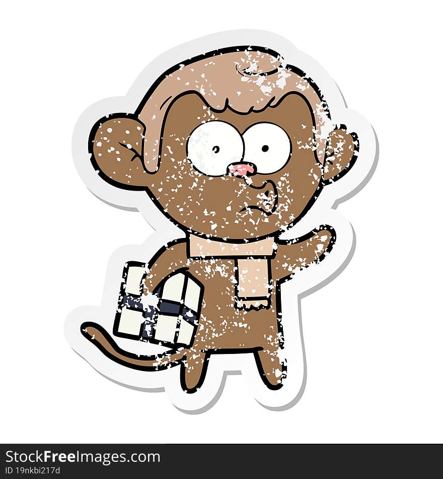 distressed sticker of a cartoon christmas monkey