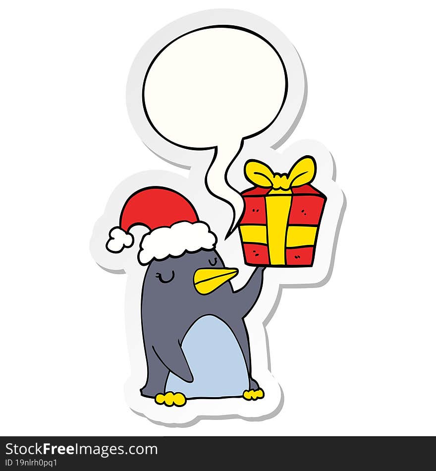 Cartoon Penguin And Christmas Present And Speech Bubble Sticker