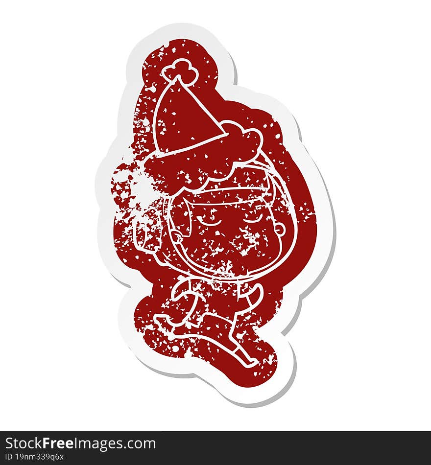 quirky cartoon distressed sticker of a confident astronaut wearing santa hat