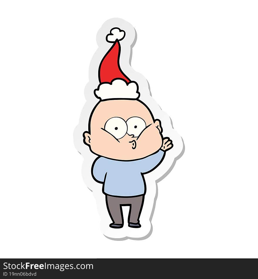 sticker cartoon of a bald man staring wearing santa hat