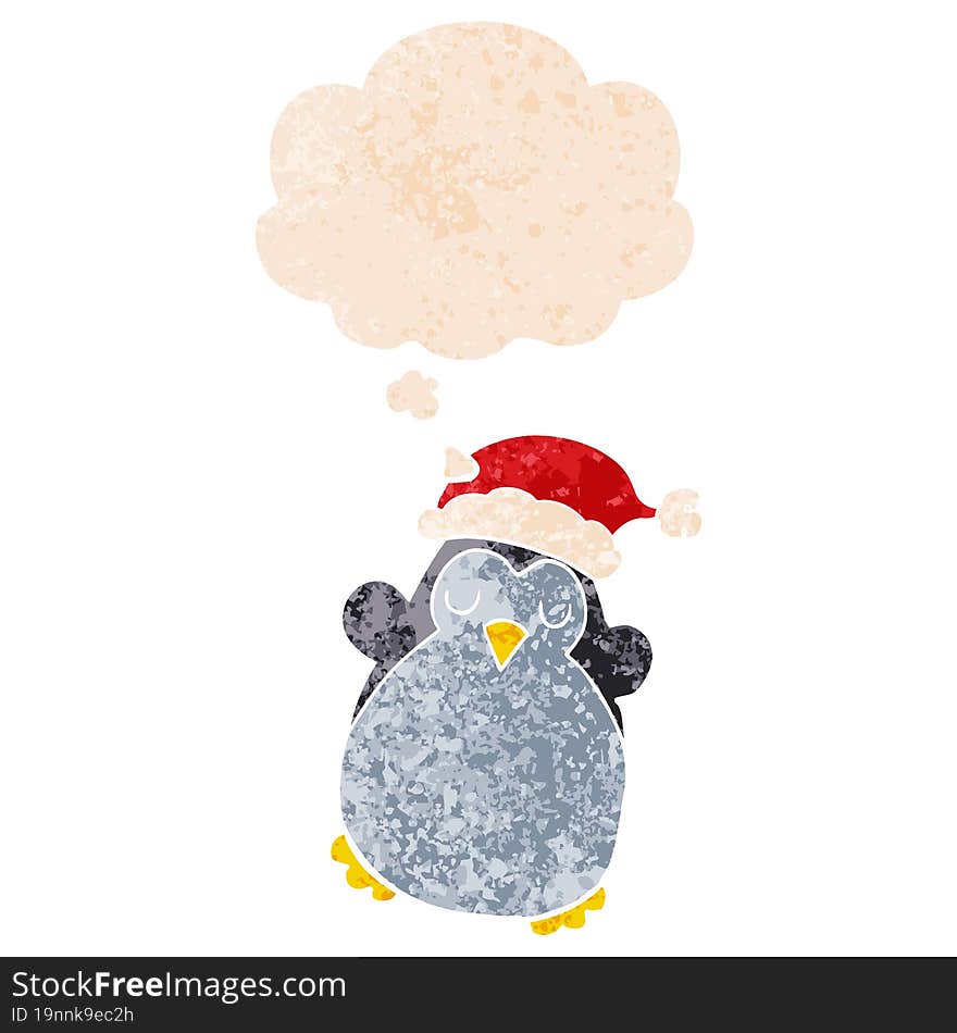 cute christmas penguin and thought bubble in retro textured style