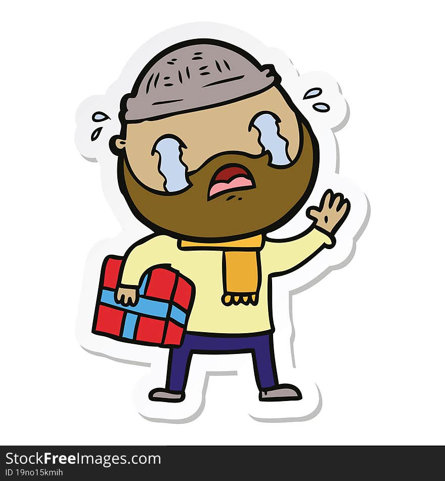 sticker of a cartoon bearded man crying with christmas present