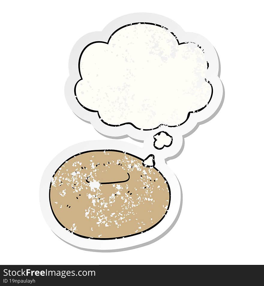 cartoon donut and thought bubble as a distressed worn sticker