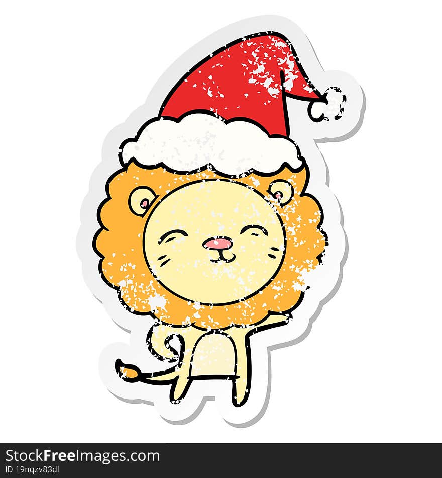 distressed sticker cartoon of a lion wearing santa hat