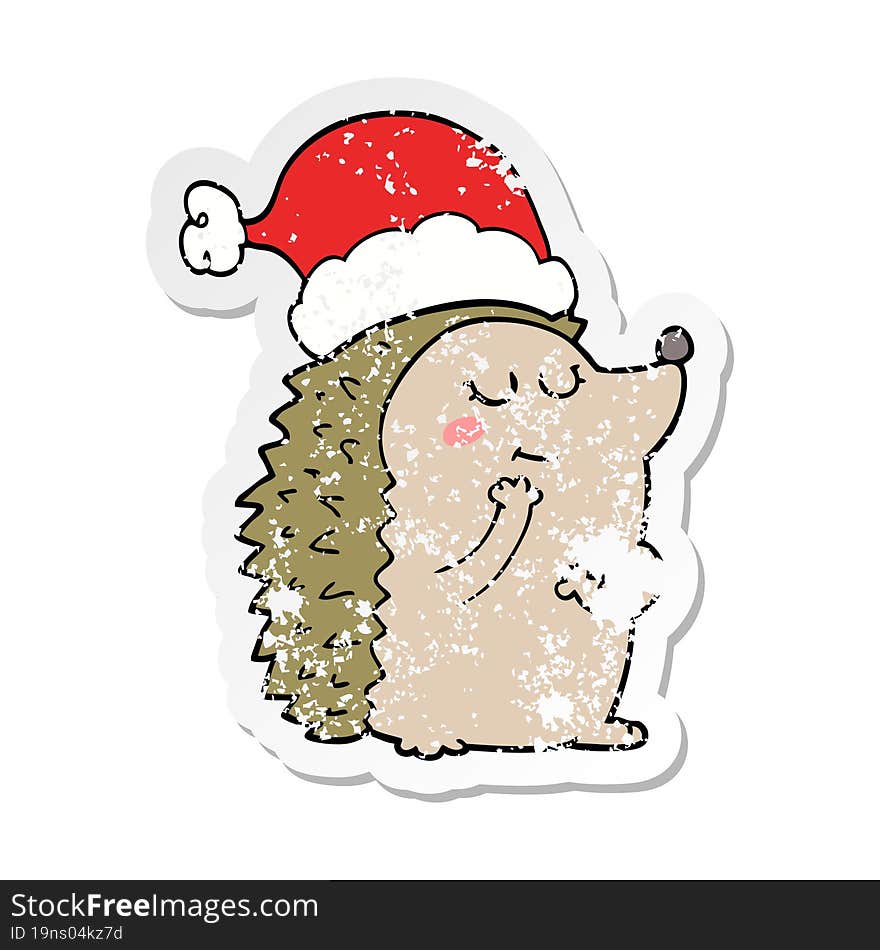 distressed sticker of a cartoon hedgehog wearing christmas hat