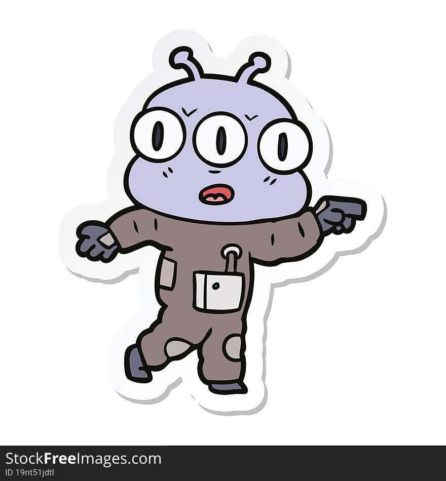 sticker of a cartoon three eyed alien pointing