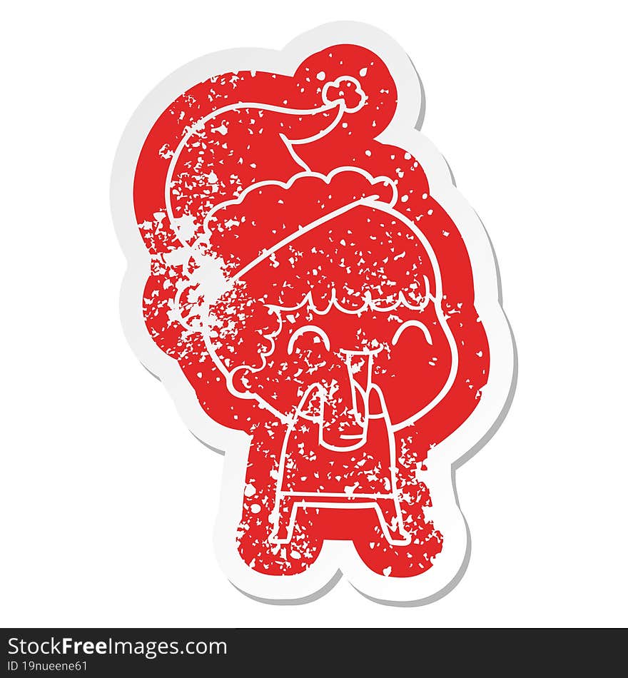 cartoon distressed sticker of a happy man wearing santa hat