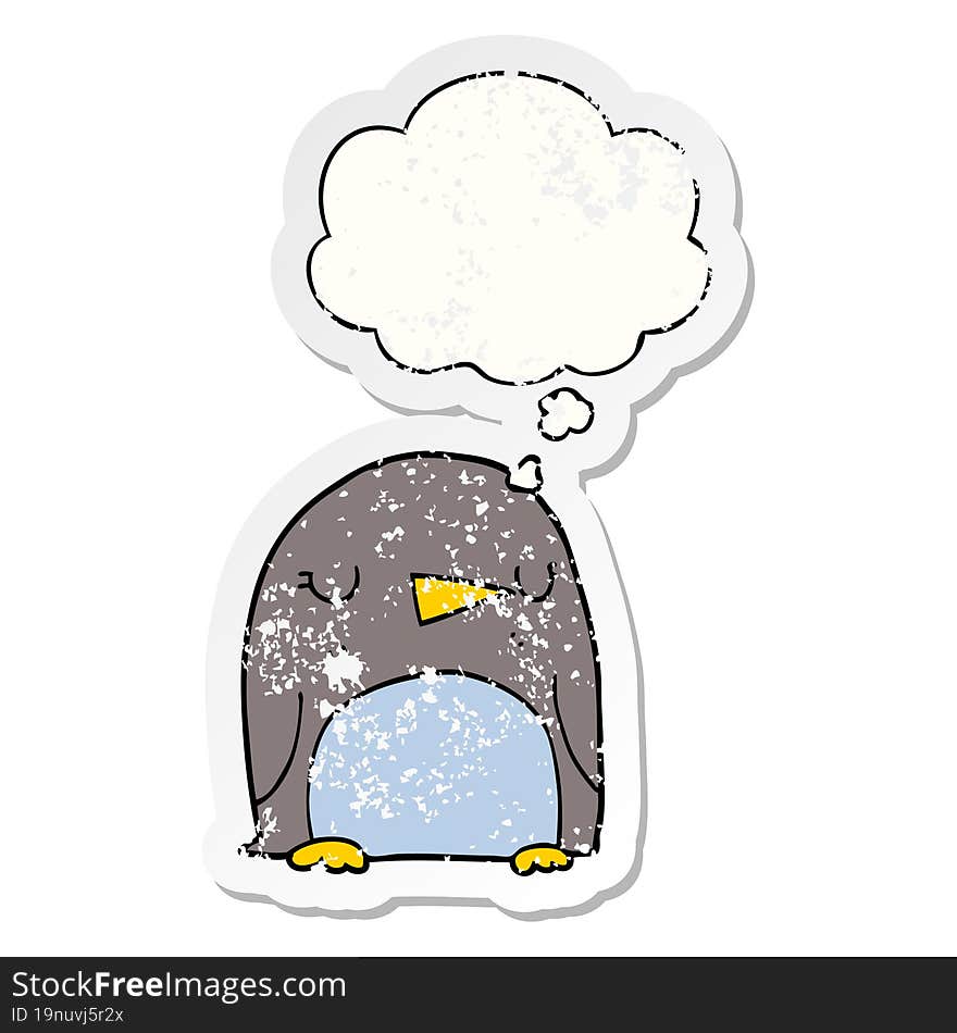 cartoon penguin and thought bubble as a distressed worn sticker